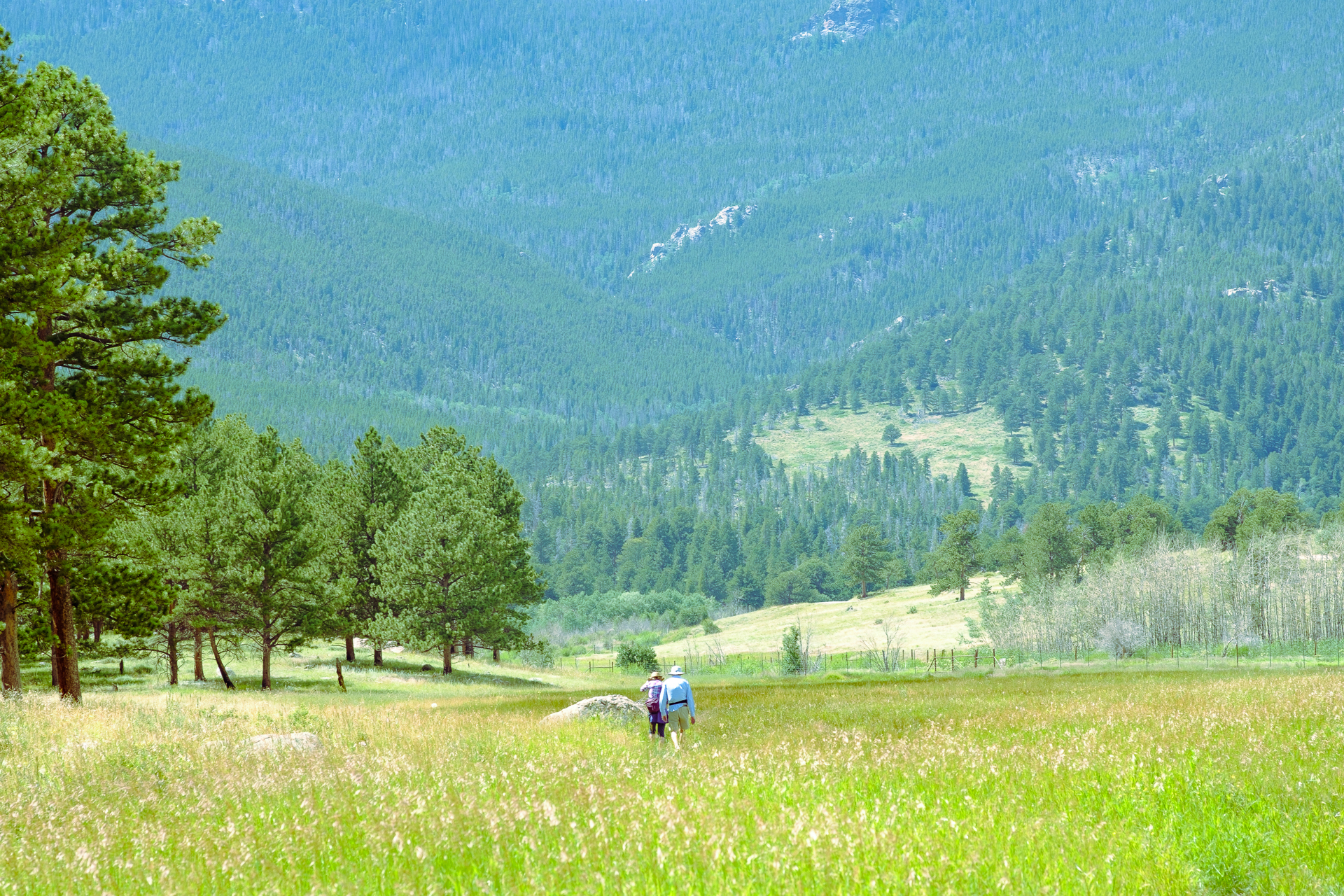Couple walking in Rocky Mountain National Park.